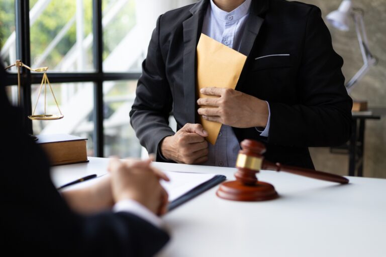 Attorney adjudicating bribery cases, Businessman trying to bribe a lawyer.