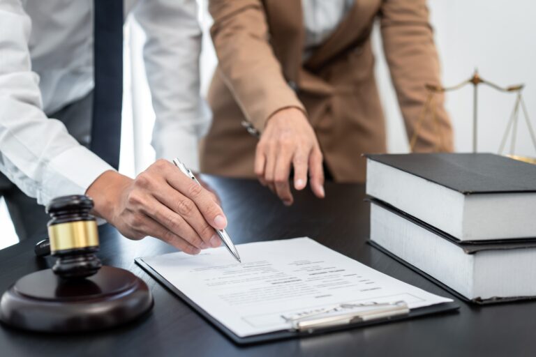 Businesswoman and Male lawyer consult and conference having team meeting with client at law firm