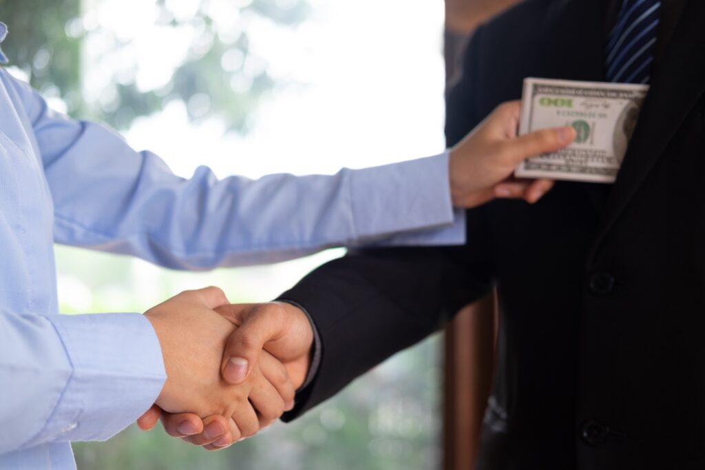 Businessman receive money.